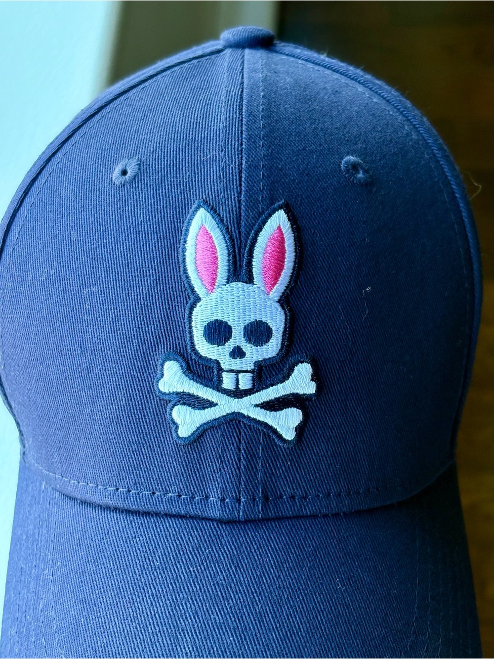 Psycho Bunny Navy Blue Adjustable Cap with Metal Skull & Crossbones Bunny Accent